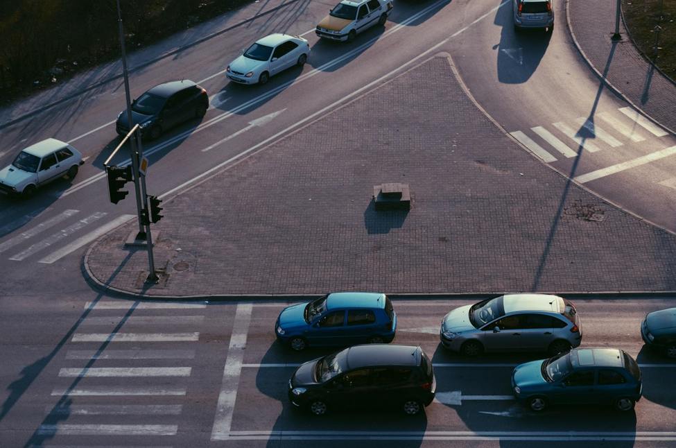 A picture of cars driving on the road, many protected by vehicle protection plans from Elijah Norton.